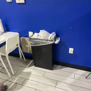 One trash can overflowing! Really?