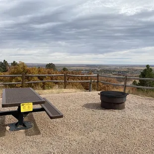 Picnic bench and fire pit with a view