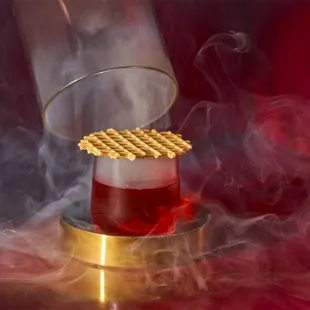 smoke pouring out of a glass