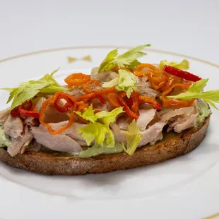 a plate with a sandwich on it