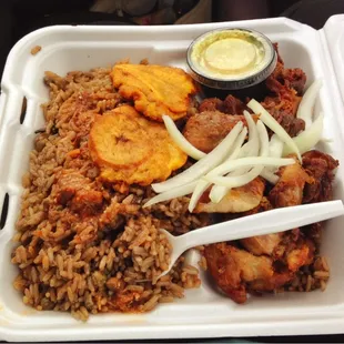 Griot, plantain, rice, pikles