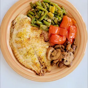 Baked tilapia with green beans and sautéed mushrooms with sweet peppers