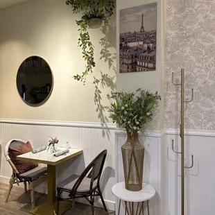 a dining room with a table and chairs