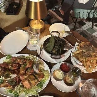 Chicken, veggie layered vegan dish, truffle fries. All delicious!