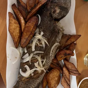a plate of fish and french fries