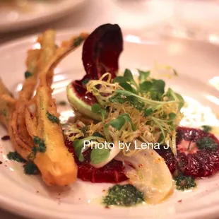 Blood orange and fennel salad with onion fritter and anchovy salsa verde ($175 restaurant menu)