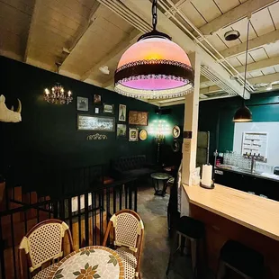 a woman standing in a restaurant