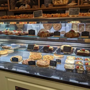 Some savory items in this side of the display case. They include a variety of quiches, croissant sandwiches, tartines, and croque monsieurs.
