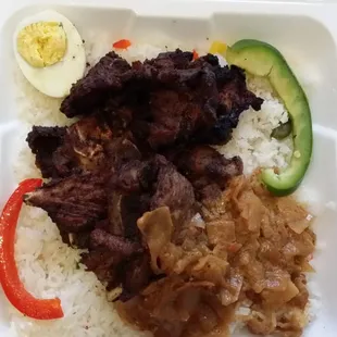 a meal in a styrofoam container