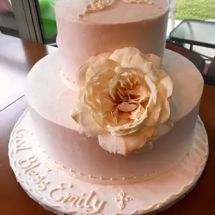 Beautiful light pink pearly baptism cake.