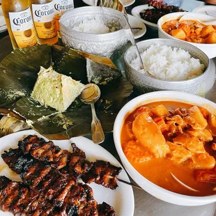 a table full of food and drinks