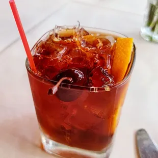 a drink in a glass with a straw