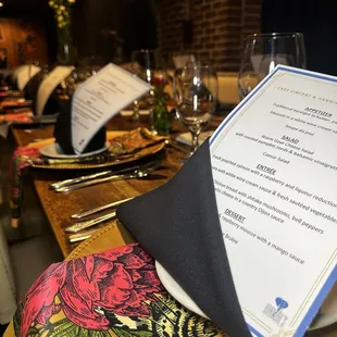 a table setting with a menu