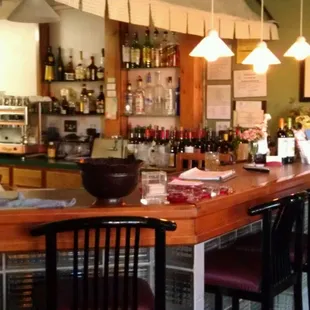 Just inside the entrance.