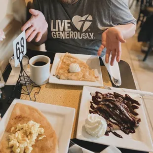 Chocolate raspberry mousse dessert crepe and vegetarian crepe as well as bacon and egg crepe.