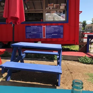 a picnic table and umbrella
