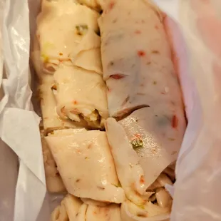 a close up of a burrito