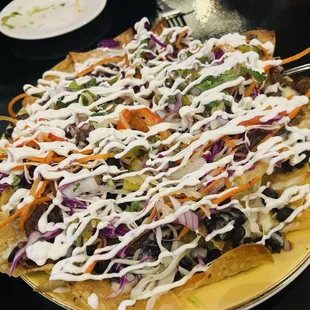 Nachos - maple beef - will be a hit for patrons sitting at bar watching sport