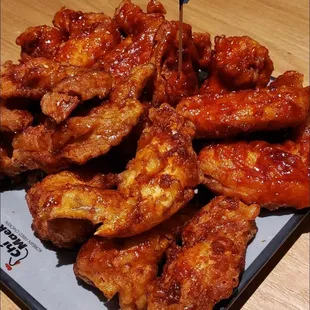 Wings in spicy sauce and soy garlic