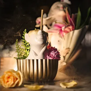 Golden Flora - infused Vodka, St. Germaine, Passionfruit, Orange Blossom, Lime Leaf, Wasabi