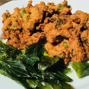 Fish cakes with crispy fried Thai basil