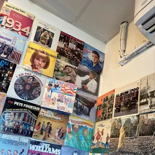 Walls decorated with old LP album covers (paired with some strange mix of old music being played in the restaurant)