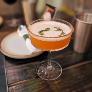 a cocktail in a coupe glass