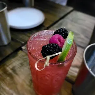 Some unknown mixed berry cocktail with lime vodka/ginger beer. Essentially a fruity tasty Moscow Mule