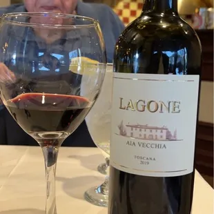 Delicious bottle of wine $35 Love my daddy in this photo; may he rest and be blessed in peace ~