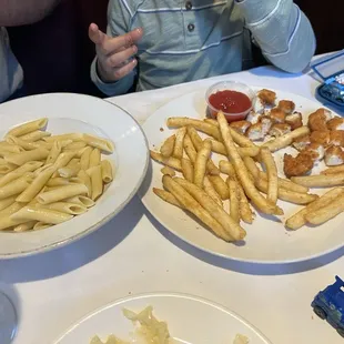 Kids Chicken Tenders with French Fries and buttered noodles