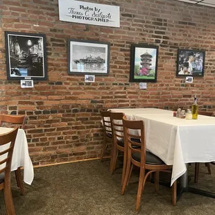a brick wall and tables