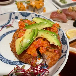 Spicy tuna crispy rice with avocado- truly the best