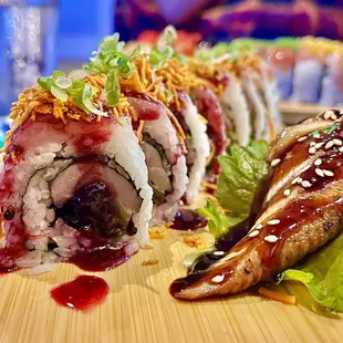 Eel sashimi &amp; Park Street roll (fresh blackberries, blackberry habanero sauce &amp; yellowtail)