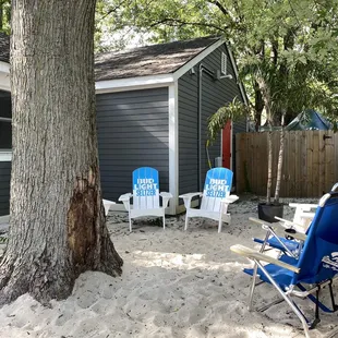 Sand waiting area in back right to drink a cocktail while you wait for a table
