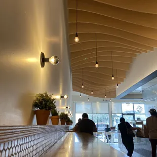 people walking in a restaurant