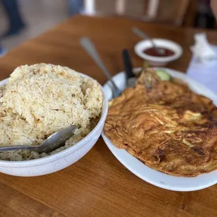 Garlic rice (bowl) and eggplant omelette / tortang talong