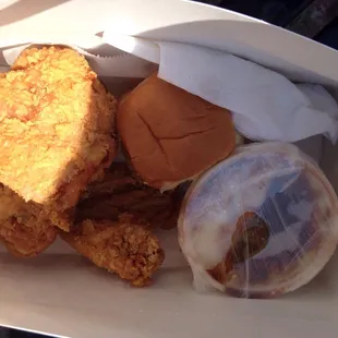 White meat chicken, mashed potatoes with gravy, and a roll