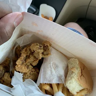 Chicken Gizzard Snack (front and center), Corn Tots (by the black console)