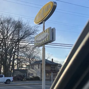 ows a sign for a restaurant