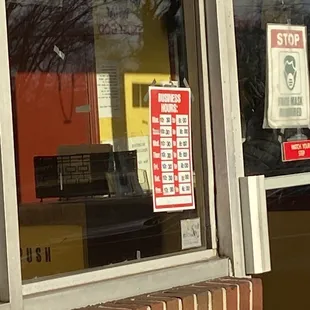 ows a sign in the window