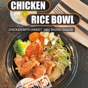 a bowl of rice with chicken and broccoli