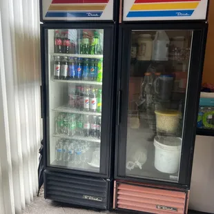 two refrigerators with drinks in them