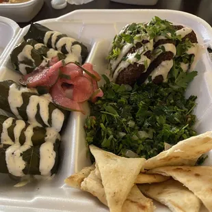 Grape Leaves, Falafel with Tahini, Tabbouleh Salad, pita