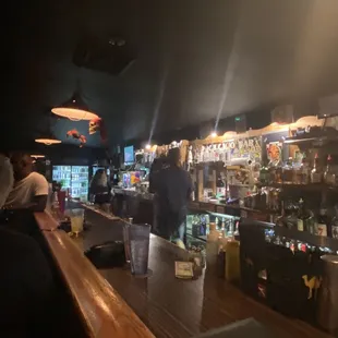 a man standing at the bar
