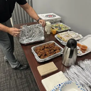 a man preparing food on a table
