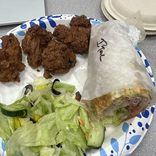 a plate of food and a laptop