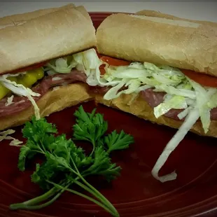 two subs on a red plate