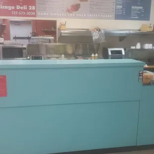 a blue counter in a restaurant