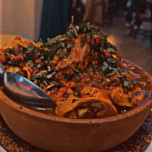 a large bowl of food on a table