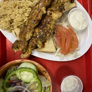 Our Chicken Kabob Plate with rice  and small garden salad